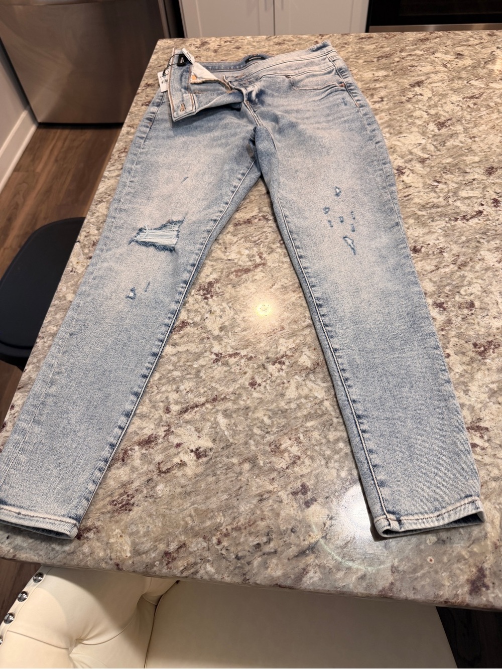 Express Light Wash Distressed Skinny Jeans